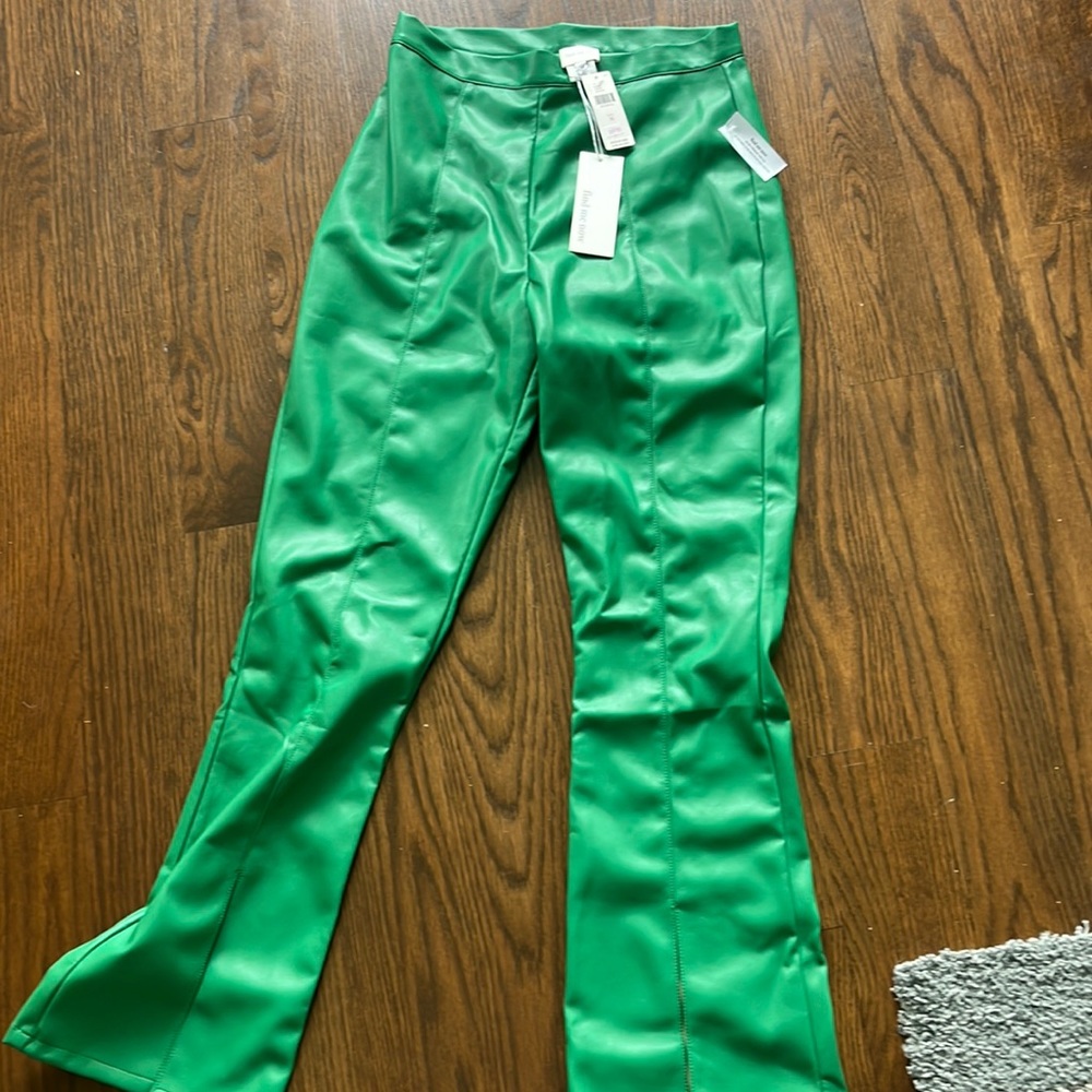 Emerald green faux leather split hem pants from Anthropologie size medium